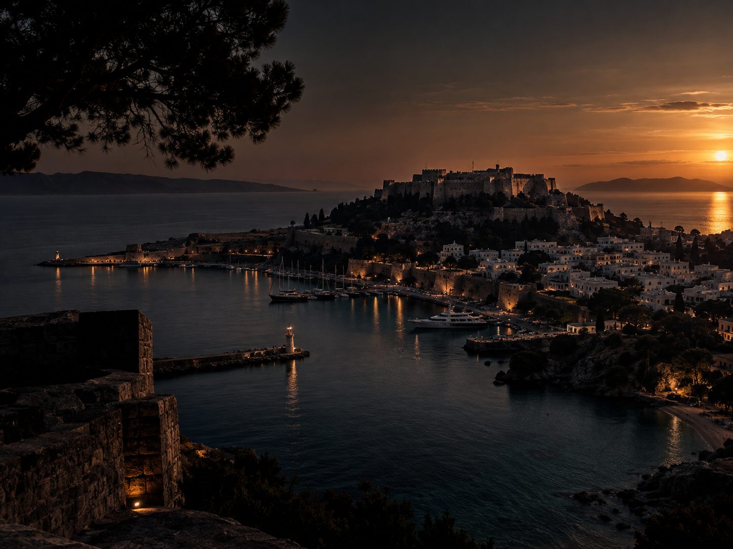 Rhodes harbour and medieval castle at sunset